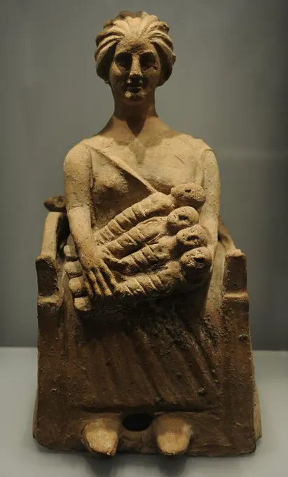 Ancient Greek Art. Archaic Period (700 B.C-480 B.C.). Goddesses rearing children. Terracotta. Statuette. Ny Carlsberg Glyptotek. Copenhagen. Denmark.