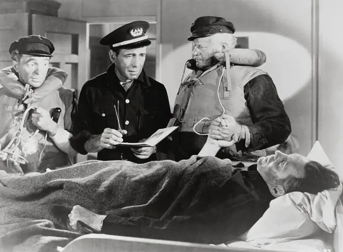 HUMPHREY BOGART and ALAN HALE in ACTION IN THE NORTH ATLANTIC (1943), directed by LLOYD BACON.