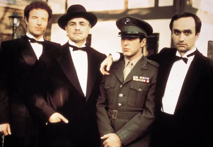 AL PACINO, JAMES CAAN, MARLON BRANDO and JOHN CAZALE in THE GODFATHER (1972), directed by FRANCIS FORD COPPOLA.
