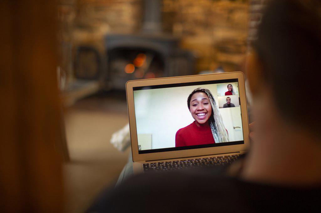 Business people video conferencing on laptop screen