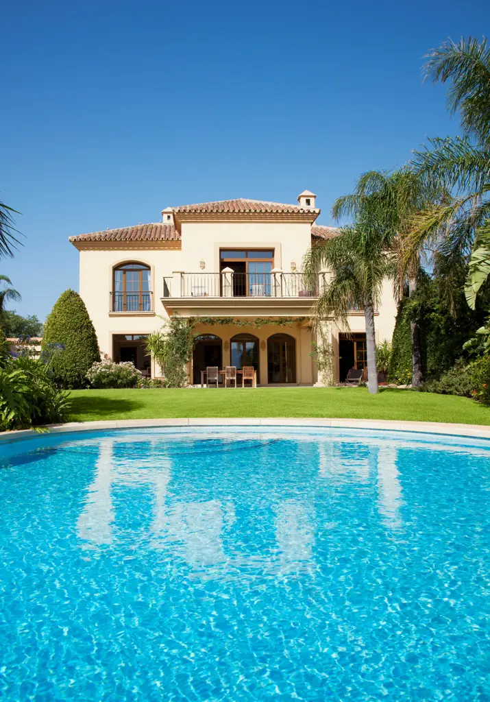 Spain, Luxury swimming pool and Spanish villa