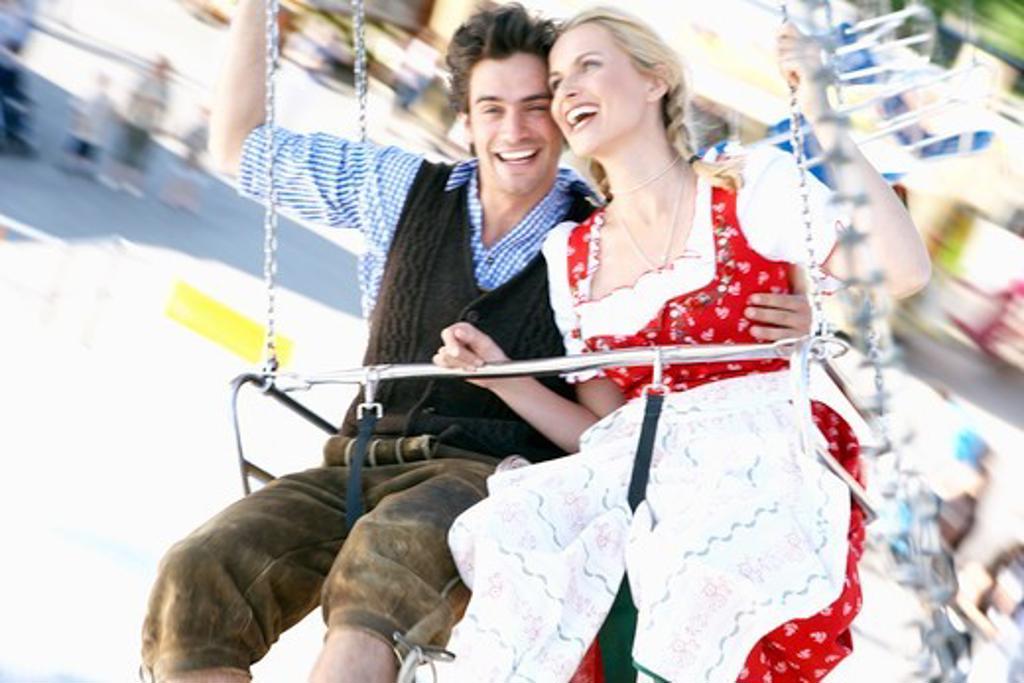 Couple in a chairoplane