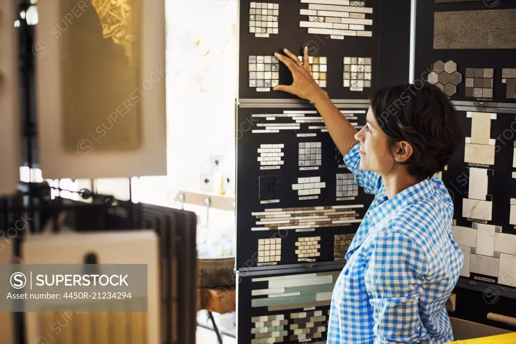 Woman looking at merchandise in an interior design store.