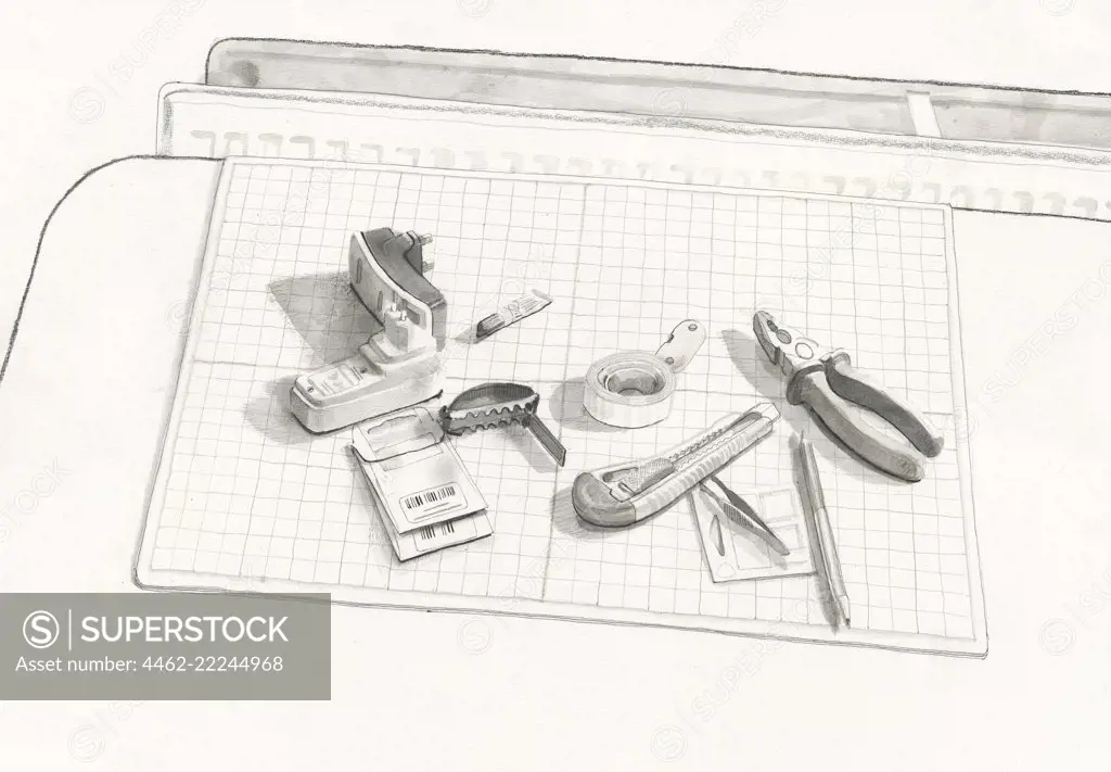 Assorted tools and paper