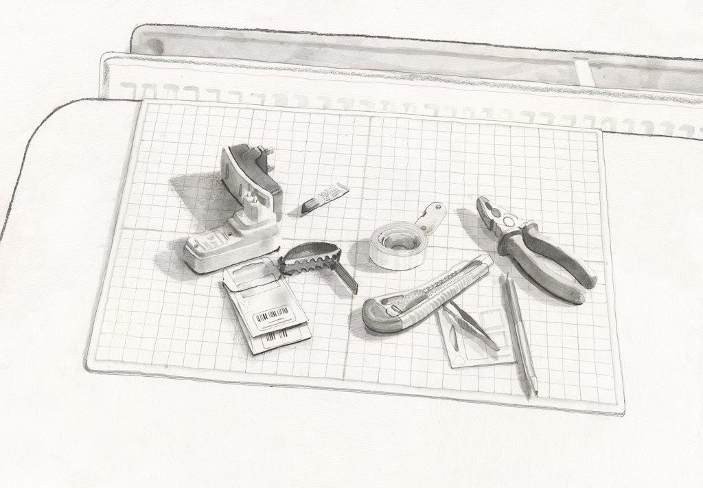 Assorted tools and paper
