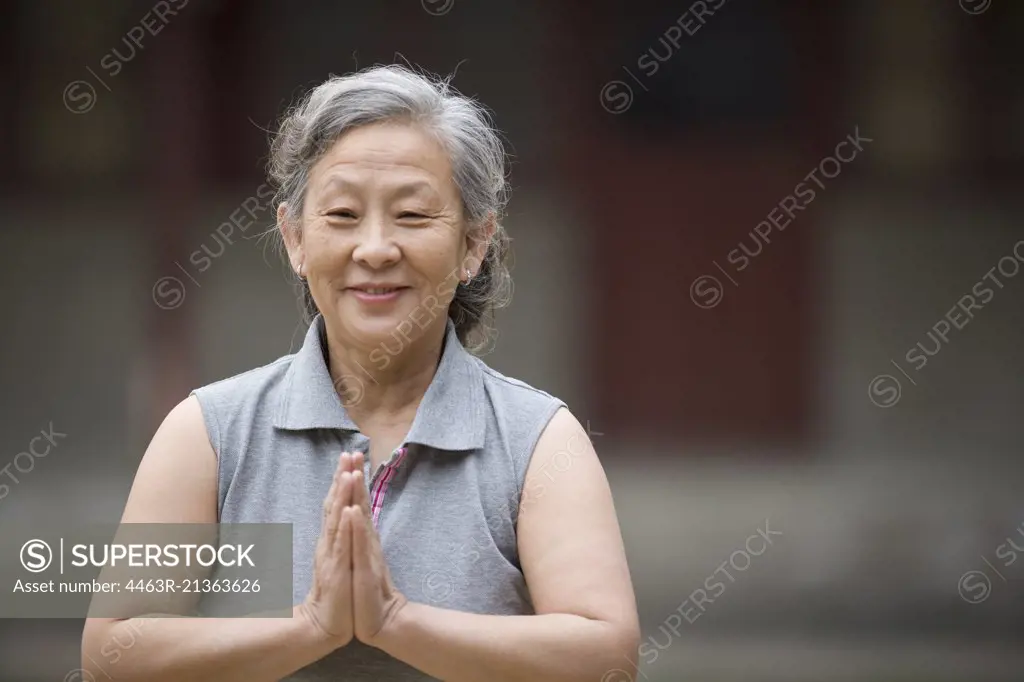 Portrait of a senior woman practicing yoga.
