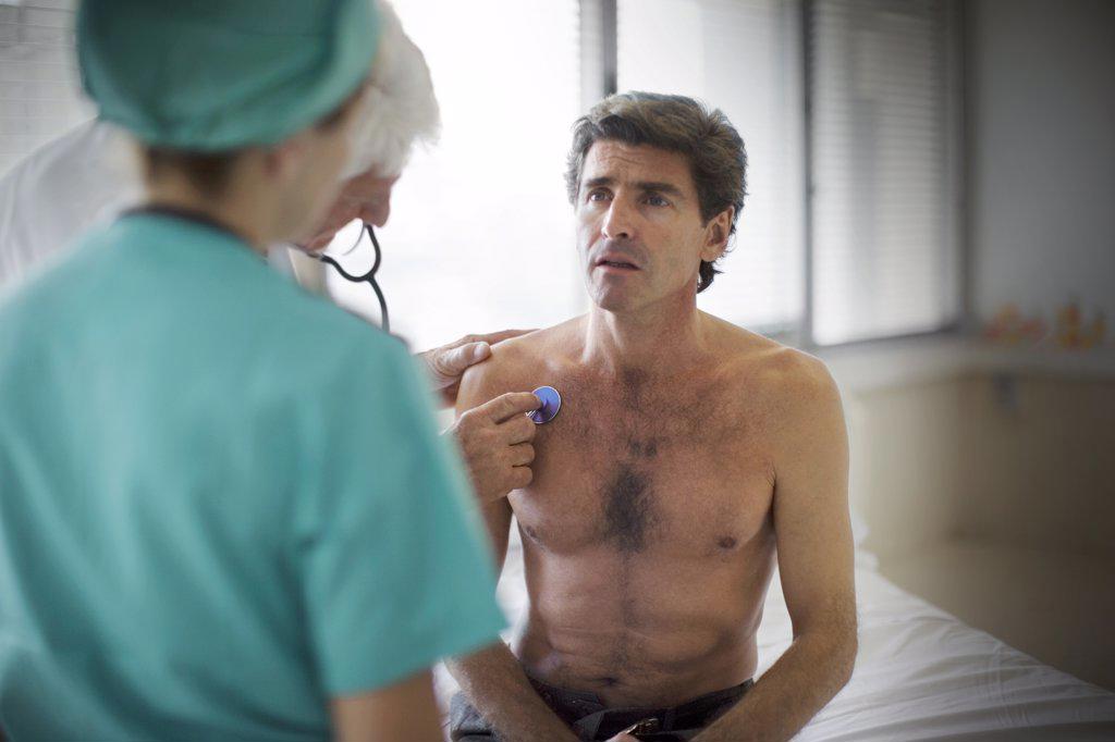 View of a man getting himself checked.
