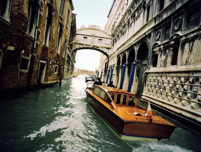Barges on a canal, Venice, Italy.