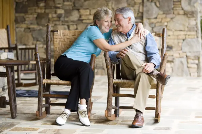 Older couple sitting in courtyard