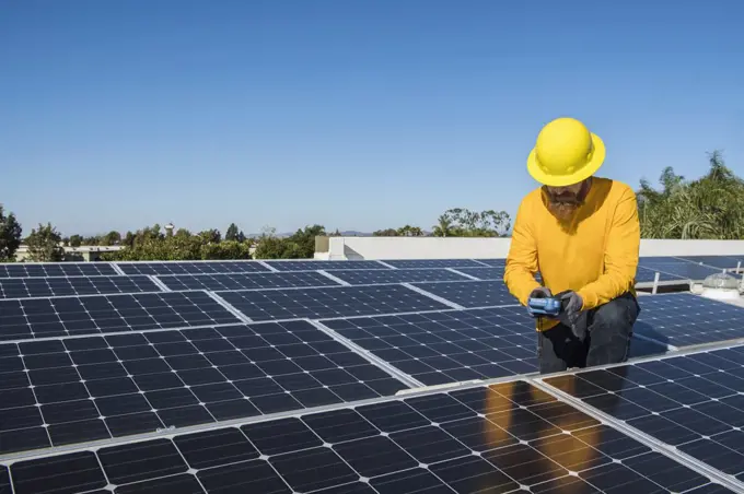Man Working With Solar Panel 