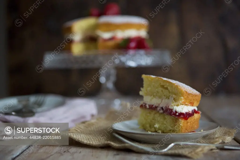 Slice of Victoria Sponge Cake with Fork