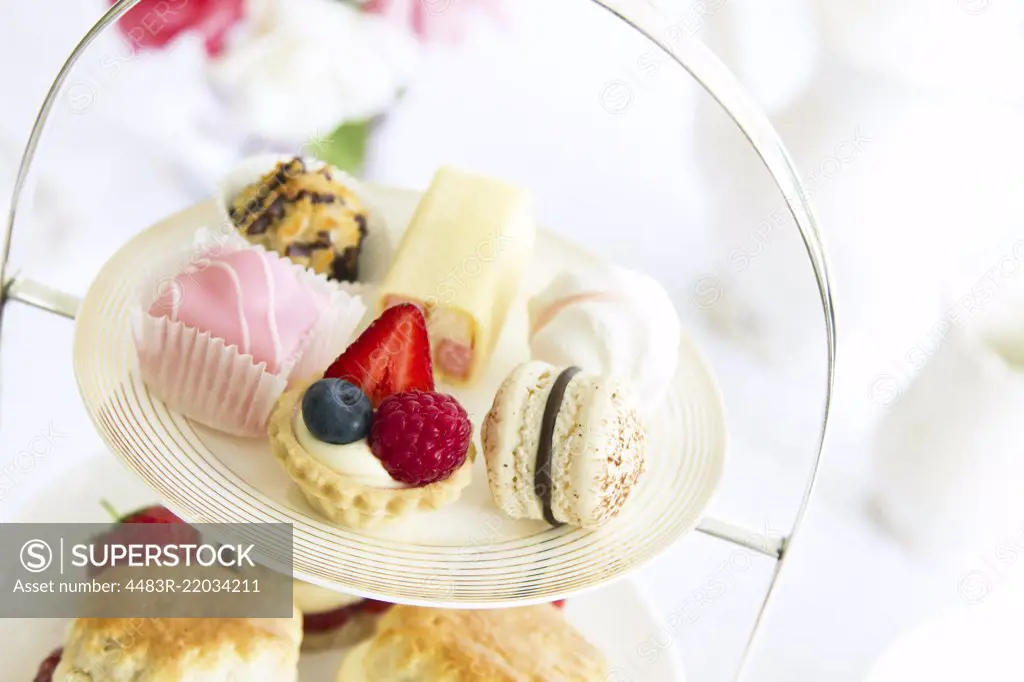 Afternoon tea served with an assortment of cakes