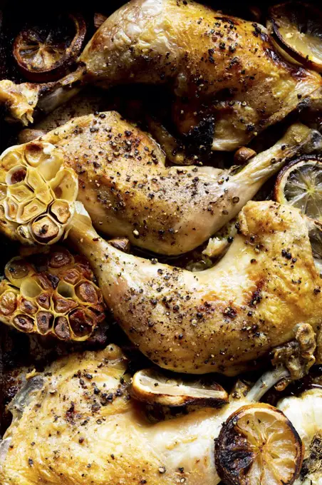 Roast Chicken Legs with sliced garlic