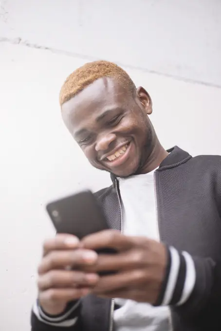 African american man making himself selfie portrait of smart phone