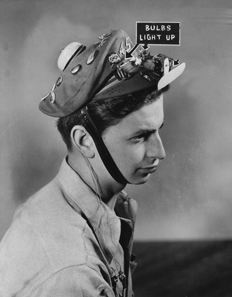 Portrait of teenage boy wearing funny cap