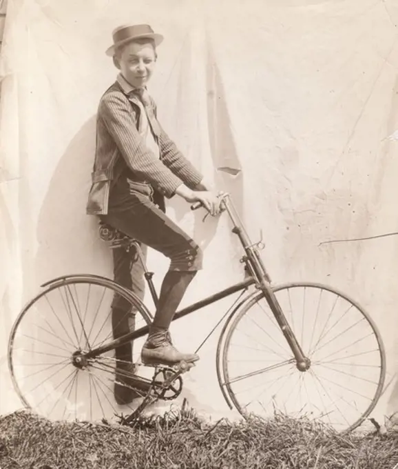 Boy posing with bike