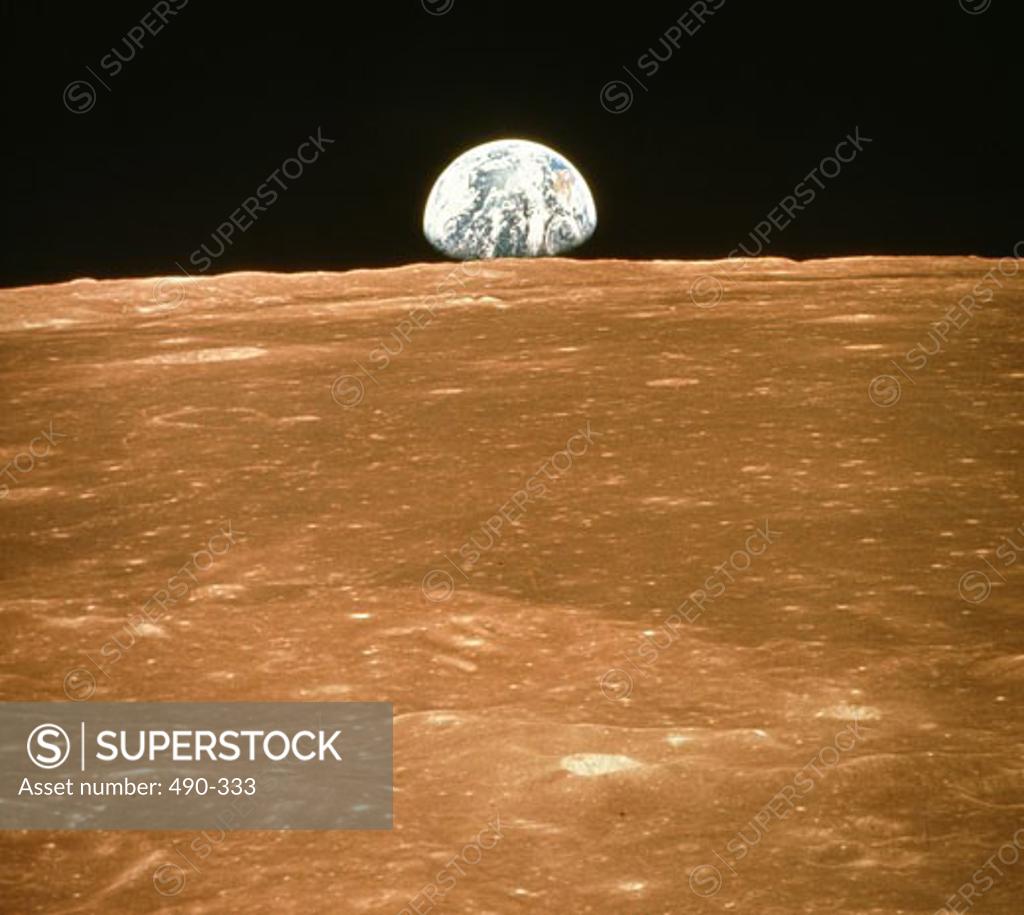 Stock Photo: 490-333 Earth Rising Over Moon