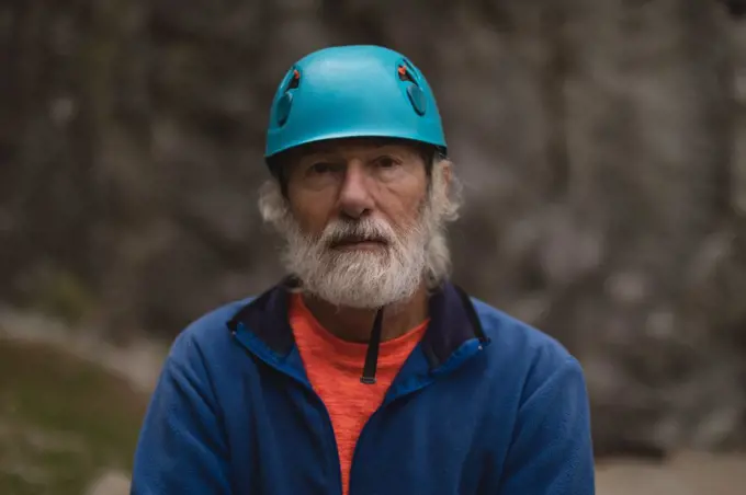 Portrait of senior man wearing protective helmet