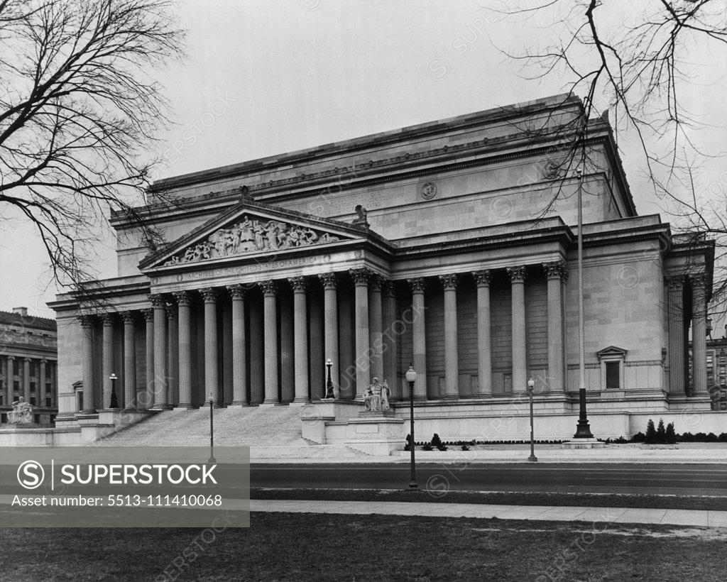 Stock Photo: 5513-111410068 National Archives, Piled Helter-Skelter for 150 Years, Are Now Preserved in a Building of Their Own. National Archives Building in Washington, D. C., built at a cost of $12,000,000 (exclusive of site), as a storage place for all of the documents of the United States which are no longer considered current, but which still have zither governmental or historical value, These documents include war proclamations, amendments, treaties, codes and declarations ***** once front page news. September 17, 