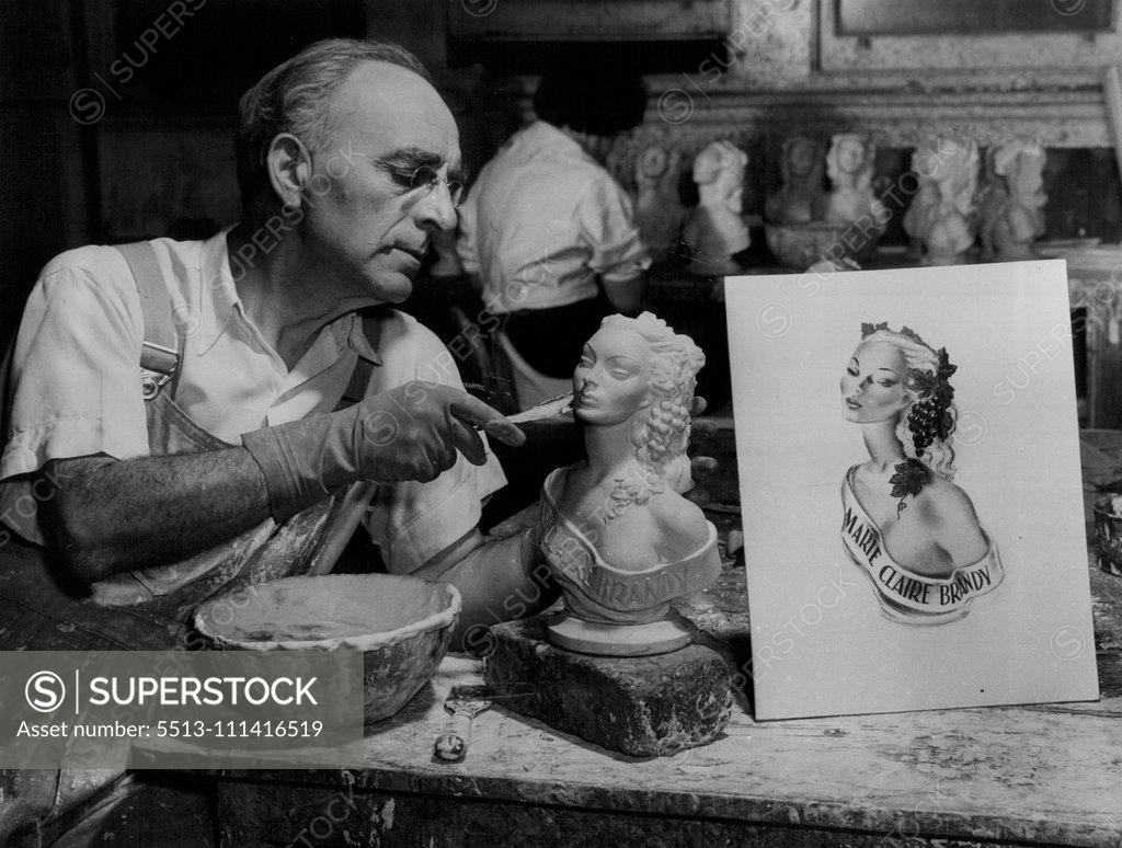 Stock Photo: 5513-111416519 Zagor at work on one of his commercial busts. It is being mass-produced to advertise a brand of liquor. March 25, 1953.