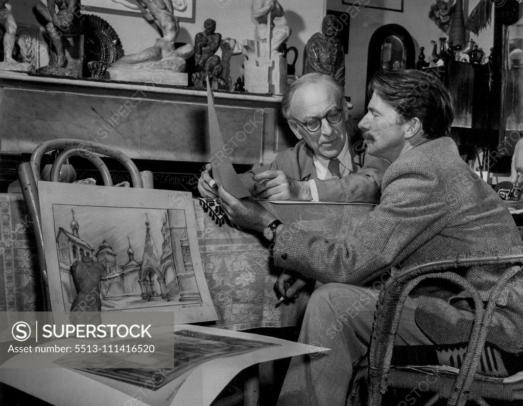 Stock Photo: 5513-111416520 His real love is for creating theatrical decor. With William Constable, the famous Australian stage designer, he goes over his plans for presenting Background to an opera. March 25, 1953.