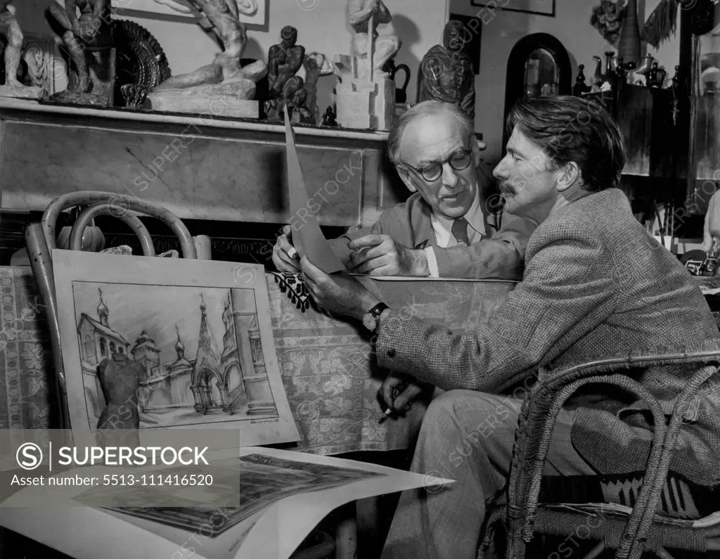 His real love is for creating theatrical decor. With William Constable, the famous Australian stage designer, he goes over his plans for presenting Background to an opera. March 25, 1953.