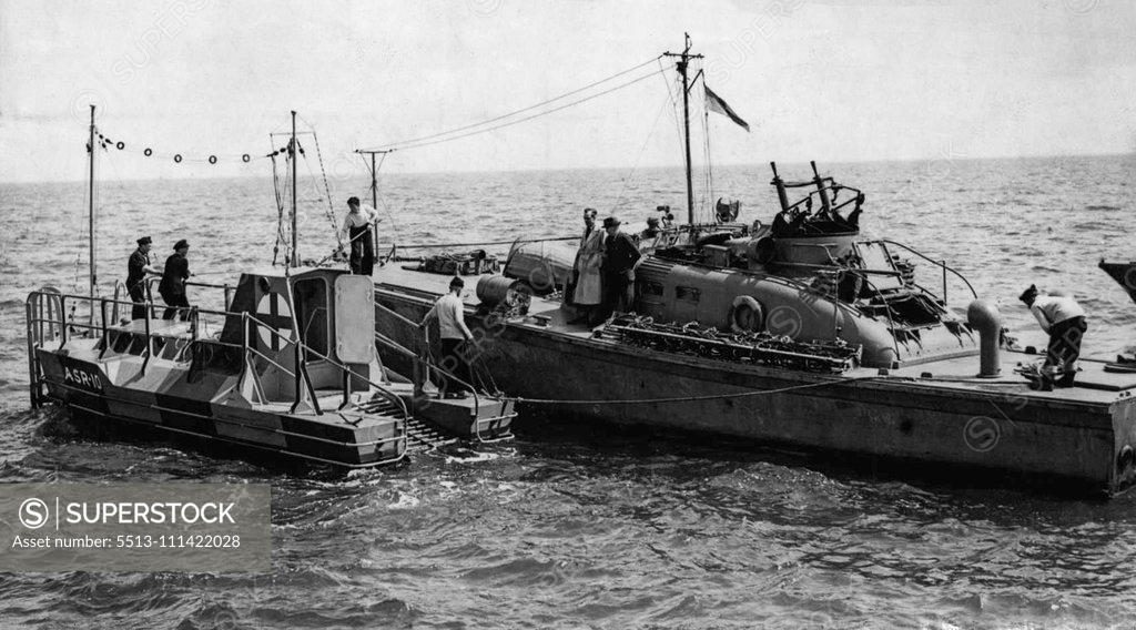 Stock Photo: 5513-111422028 New Channel Sweep -- The rescue launch meets its objective. One of the new R.A.F. rescue boys which are moored at intervals for baled-out plants. August 2, 1941. (Photo by Keystone).