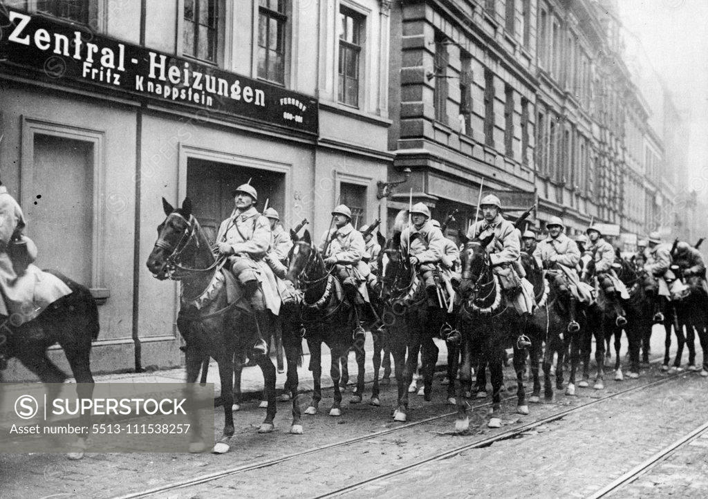 Stock Photo: 5513-111538257 The French Occupation of Ruhr Valley: French Cavalry entering Essen. January 1, 1929. (Photo by Central News).