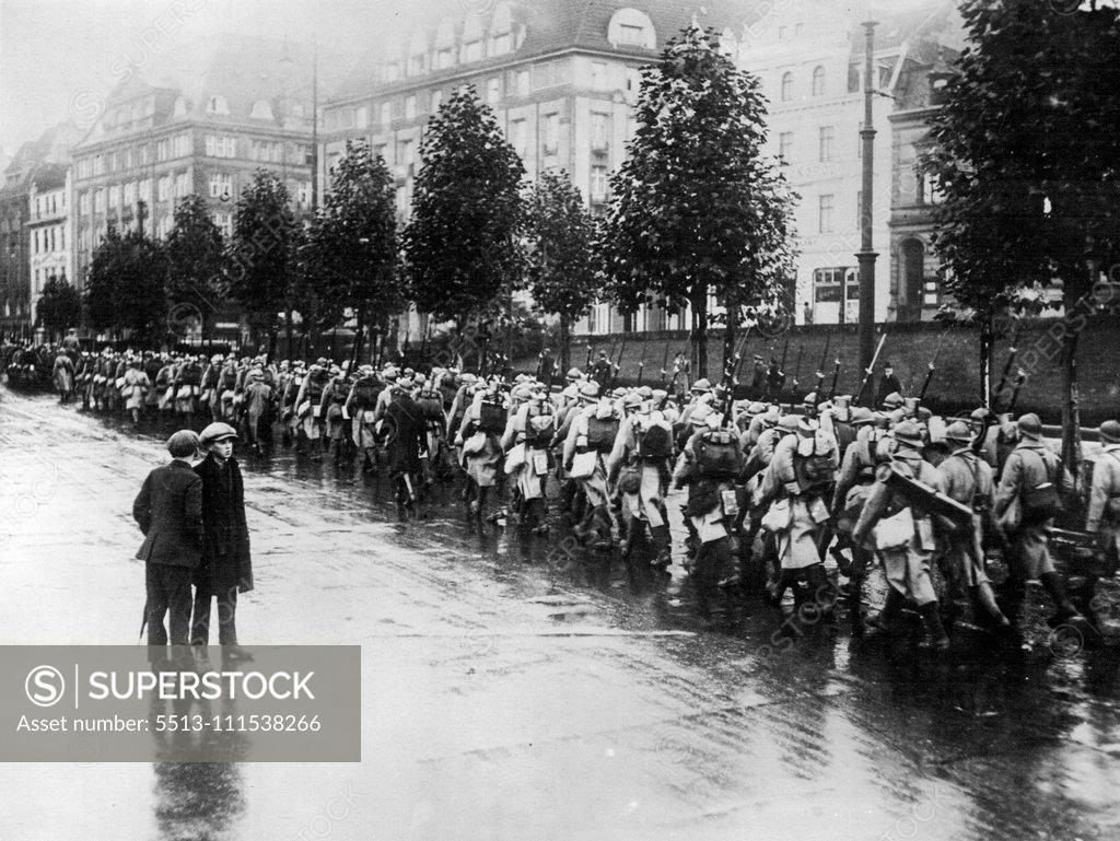 Stock Photo: 5513-111538266 French Troops Evacuate Dortmund: A general view of French troops evacuating Dortmund. January 1, 1929. (Photo by London News Agency Photos Ltd.).