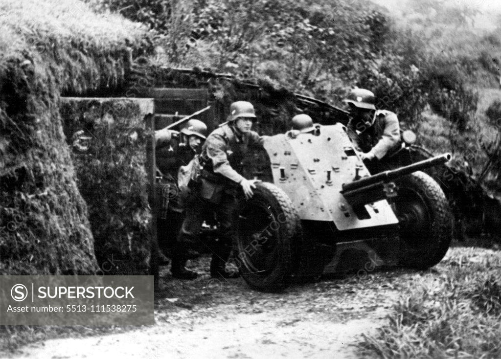 Stock Photo: 5513-111538275 The fortifications in West Germany: An anti-tank gun will make ready-made one, fresh overgrown and camouflaged concrete bunkers rolled out. As the leader in the last Nazi Party safeguards announced that he given the armor of the other Powers had meet need in order to secure peace and the work of the German people, because listening to the whole world. Today the entire German North attachment is nearing completion; the first soldiers as crew already drawn and one can say that here no one gets thr
