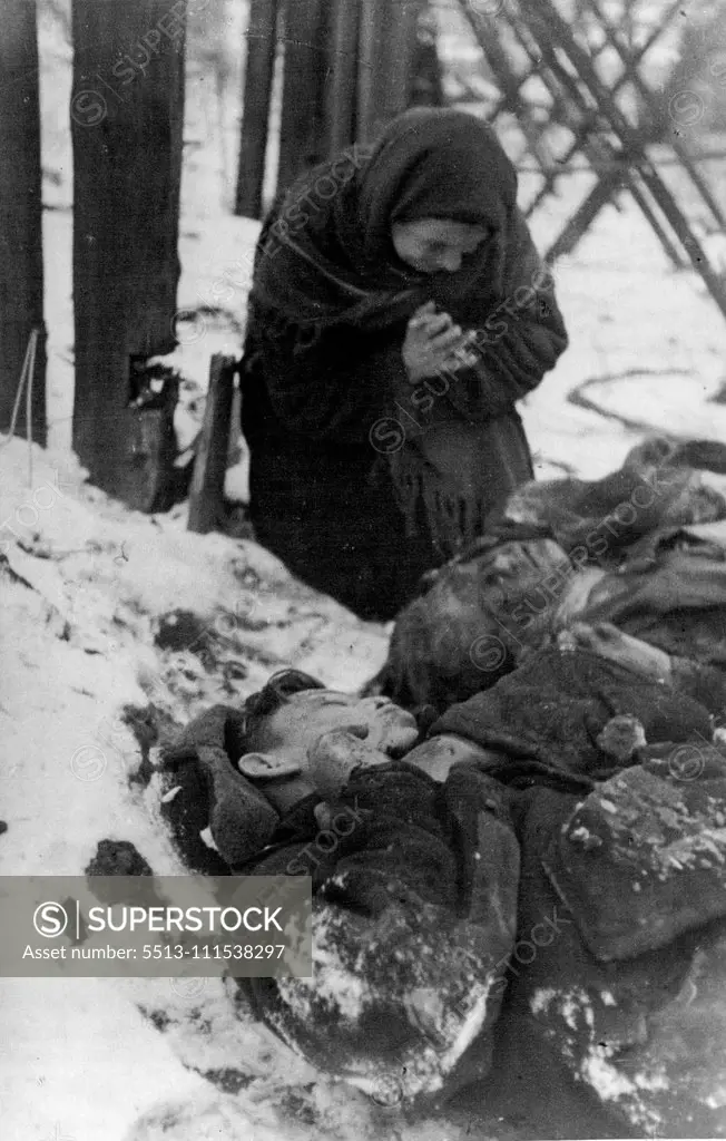 Hitlerites' atrocities in the occupied Soviet regions: Matrena Ossina, of Rostov on Don, found the bodies of her son and grandson shot by Germans. January 10, 1943.