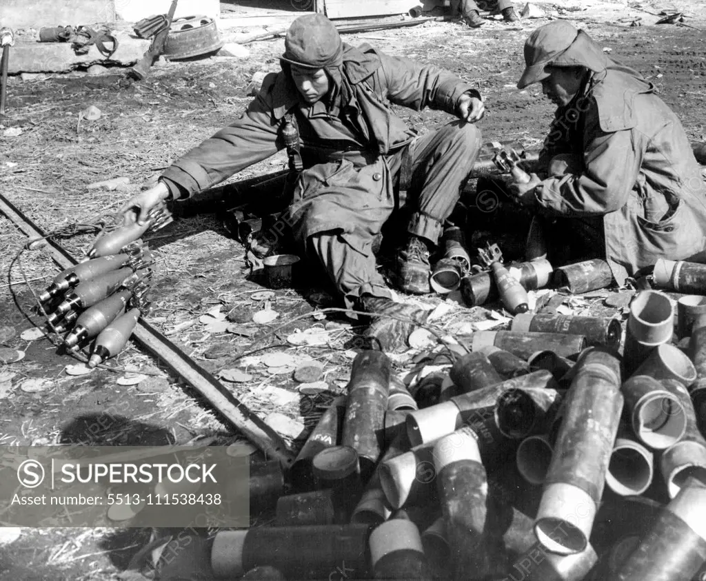 A Day With the 25th (Fourth of Ten) - South Korean Soldiers check fuses on 81mm mortar shells before they are brought up to 25th division mortar crews north of Anyang. February 3, 1951. (Photo by ACME).