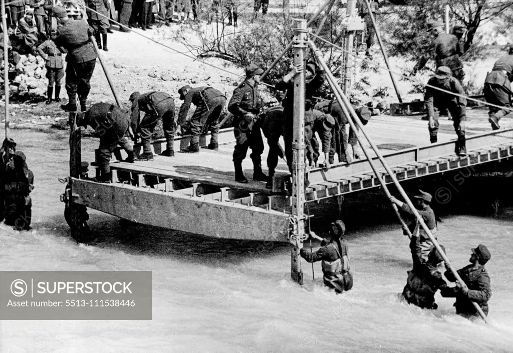 Manoeuvres of the Pioneers - T.P.S. pioneers constructing a bridge across a rapid mountain river in Bavaria. August 3, 1937.