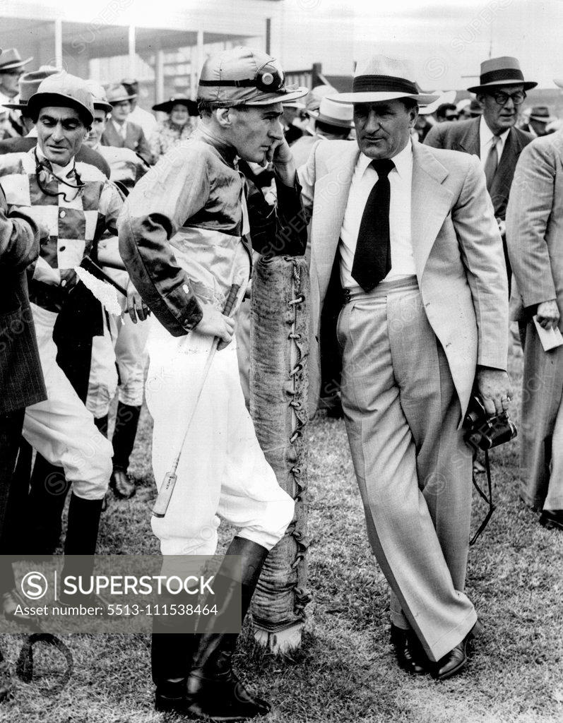 Stock Photo: 5513-111538464 Jockey J. Thompson and trainer C. Rolls of "Close Link" prior to 1st Race. January 19, 1955.