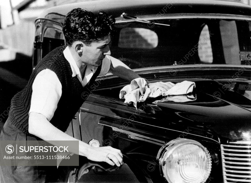 Stock Photo: 5513-111538466 Sydney jockey Jack Thompson earned big money as an apprentice and had no trouble in buying a car. Above picture was taken eight years ago. October 8, 1947.