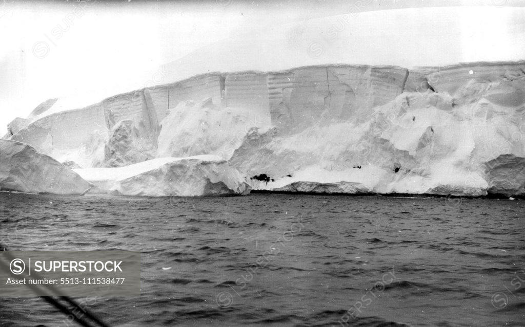 Stock Photo: 5513-111538477 Captain Sir Hubert Wilkins stirring camera record of the second Hearst-Wilkins Antarctic Expedition. These exclusive pictures taken by Captain Sir Hubert Wilkins from an inspiring photographic record of the second Hearst-Wilkins Antarctic Expedition, revealing more of the icy secrets of that vast, mysterious and almost inaccessible polar continent. The base for the expedition was established at deception Island, an old whaling observations and taking pictures. The other members of the expedition