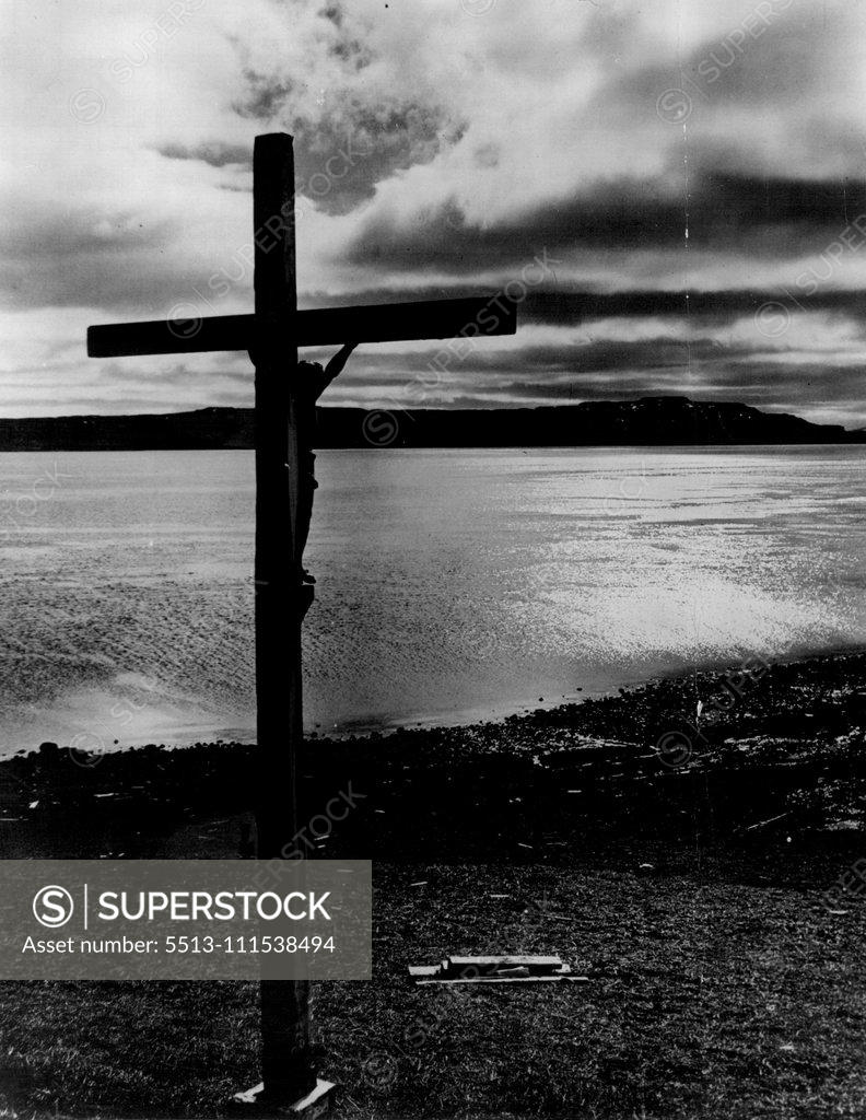 Stock Photo: 5513-111538494 This Calvary erected on the lonely foreshore at Port Jeanne D'Arc Kerguelen by the members of a French scientific Mission bears the inscription. "In recognition of the benefits that Divine Providence has accorded us during our voyage and our stay at Kerguelen, we have erected this Calvary which we place under the safeguard, and recommend to pious cases of all these who come here after us." April 15, 1930. (Photo by Captain Frank Hurley, The Herald Feature Service).