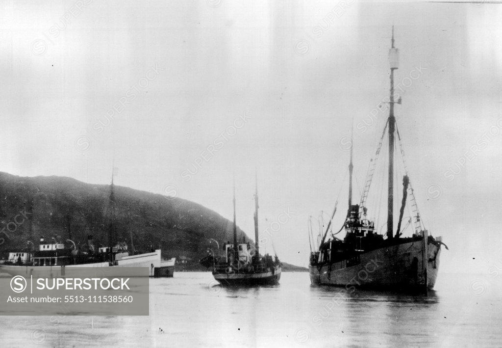 Stock Photo: 5513-111538560 Andree's Camp on White Island: After Thirty-Three Years: The Bratvaag lying at anchor at Skjervo, on the northern coast of Norway, after the return from White Island with the relics of the Andree Expedition. On the left are two steamers Heimen and Tromso Boy, with Press representatives aboard. October 15, 1930. (Photo by The Times)