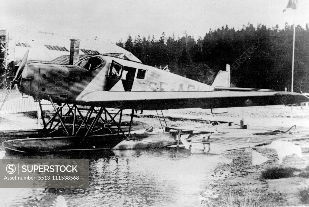 Stock Photo: 5513-111538568 Andree Expedition Discovery: The plane which is bringing photographs from Tromso to England. October 15, 1930. (Photo by The Times).