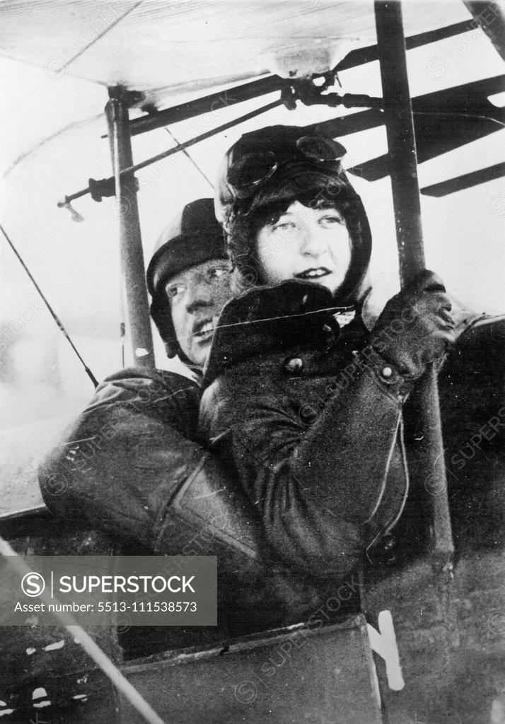 Stock Photo: 5513-111538573 Find the dead body of Andree. The Finish pilot-woman Gisken Jakobsen (the only flying lady in Finland) with her intended husband, the pilot Leppinen, who was flying to the "Braatvaag" and there greeting the dead body of Andree. The engaged couple Mrs. Gisken Jakobsen and Leppinen. November 17, 1930. (Photo by Atlantic Photo-Co.).
