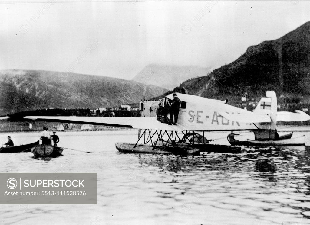 Stock Photo: 5513-111538576 Andrew's Camp on White Island - After thirty-three years: Aftenposten airplane lying at Tromso Harbour waiting to start back towards Oslo with photos from the Bratvaag. November 17, 1930. (Photo by Associated Press).