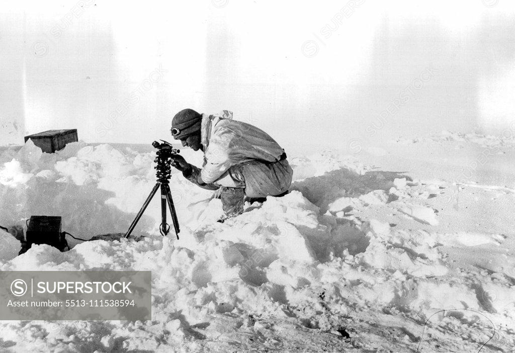Stock Photo: 5513-111538594 British Arctic Air Route Expedition: Chapman taking observations with theodolite near the ice cap station. July 30, 1931. (Photo by J. R. Rymill, British Arctic Air Route Expedition Photograph).