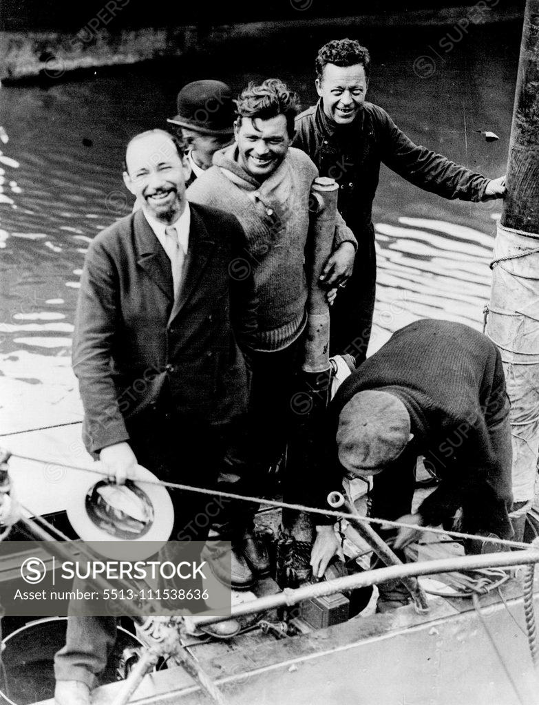 Stock Photo: 5513-111538636 'The Nautilus Arrives in Ireland' - Sir Hubert Wilkins with members of his crew on board. The Nautilus, in which Sir Hubert Wilkins hopes to reach the North Pole, arrived at Queenstown, Ireland yesterday. June 23, 1931. (Photo by Photopress).