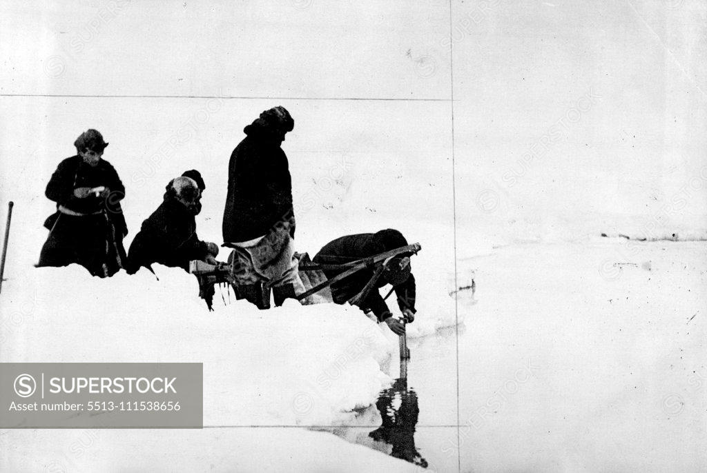 Stock Photo: 5513-111538656 Scientifical work on the Soviet North Pole Station: The winter dwellers of the Soviet station on the drifting ice-floe, taking the first water test from the Arctic Ocean on the North Pole. July 1, 1937. (Photo by Soyuzphoto).