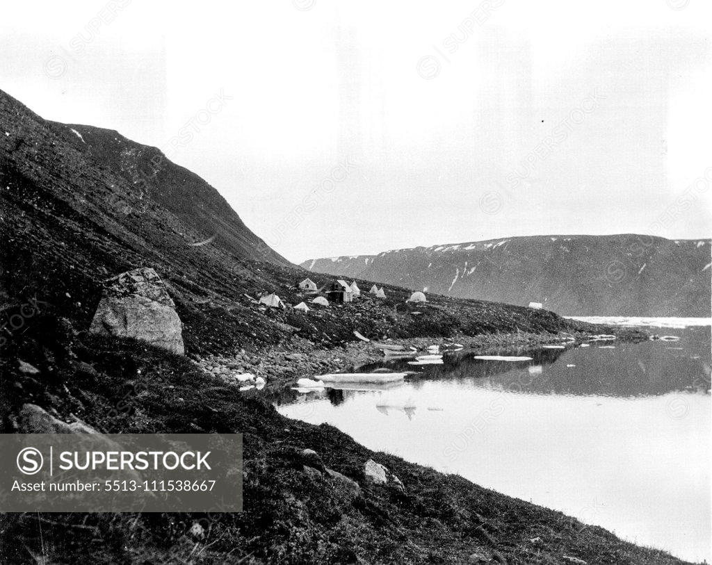 Stock Photo: 5513-111538667 Oxford University Ellesmere Land Expedition: View showing the expedition's winter quarters and Fiord at Foulke sound, Etah. July 29, 1935.