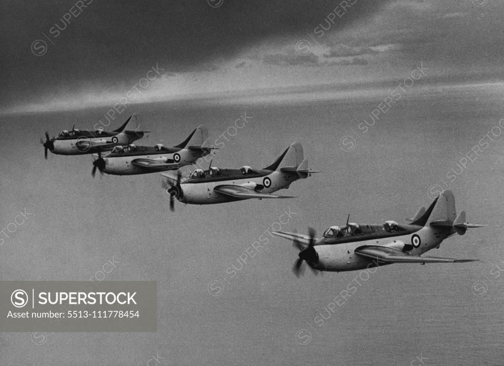 Stock Photo: 5513-111778454 Navy's Anti-Submarine Planes Today's picture of 703 X flight of the Fairey Gannet anti-submarine aircraft that have just been formally inaugurated at the R.N. Air Station at Ford, in Sussex. This air-to-air picture was taken after the ground ceremony earlier. April 5, 1954.