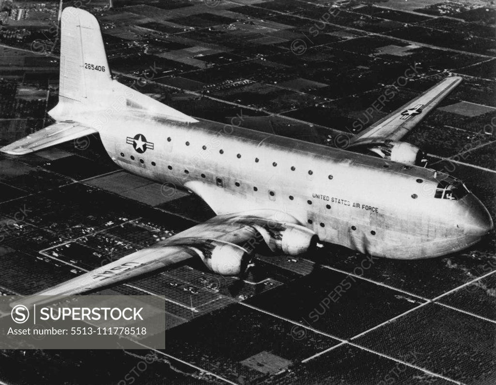 Stock Photo: 5513-111778518 Giant Transport Like This One Missing On Atlantic Flight -- Shown above is a giant U.S. Air Force C-124 or Globemaster II. A plane of this type disappeared in bad weather today on a flight from the U.S. to England. The British Press Association reported there were 52 persons aboard the plane last heard from in a routine radio check 800 miles southwest of Ireland. Transport was en route from Limestone, Me., to the American base at Mildenhall, Suffolk, England. March 23, 1951. (Photo by AP Wirepho