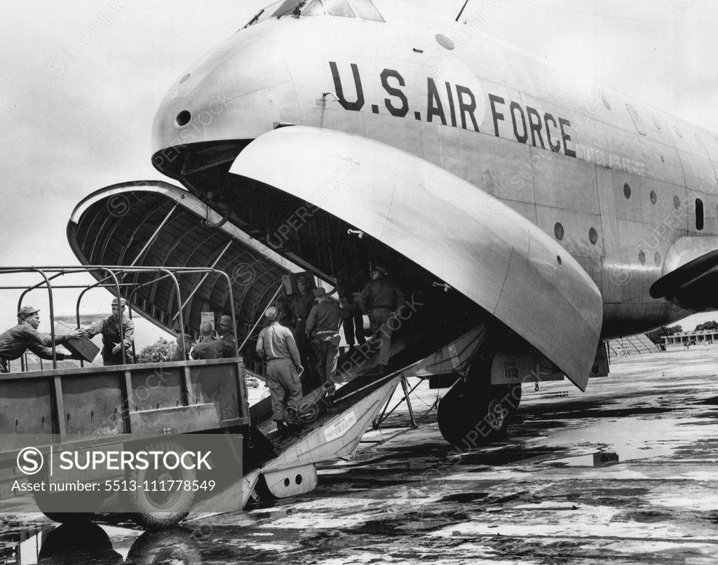 Stock Photo: 5513-111778549 U.S. Air Force C-124 Globemaster is Unloaded in Flood-Stricken East Pakistan The first U. S. Air Force C-124 Globemaster of the Far East Air Forces' 374th Troop Carrier Wing, from Tachikawra Air Installation near Tokyo, Japan, to land at Dacca, East Pakistan, Aug. 16, is unloaded by U. S. Army personnel of the 37th Medical Preventive Medicine Company. United States aid, in the form of medical supplies and personnel, was airlifted to East Pakistan to assist the 7,000,000 flood victims isolated by
