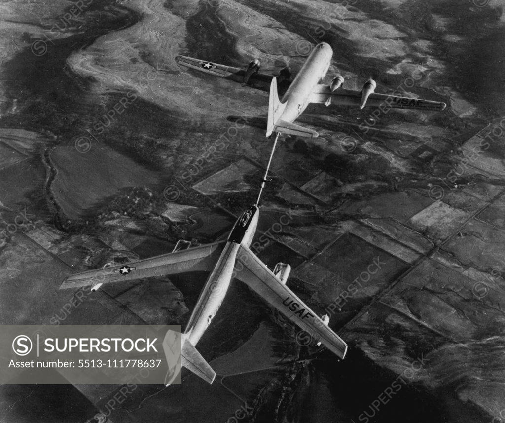Stock Photo: 5513-111778637 Fastest Jet Bomber Tanked Up In Air -- Here's the first released picture of the world's fastest bombers, a six-jet, 600-mile an-hour Boeing B-47 stratojet bomber, (bottom) being refueled from a double-deck Boeing KC-97A tanker plane. In this method of refueling, now a standard U.S. Air Force practice, fuel boom form under tail of tanker plane is connected with coupling in nose of bomber and the fuel is pumped in at high speed. June 18, 1951. (Photo by AP Wirephoto).