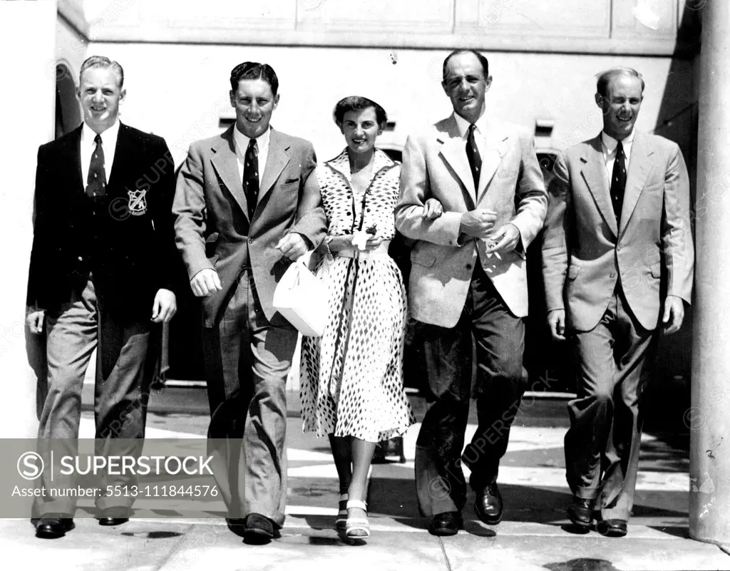 Model. Australian-born model. Mrs. Ossendryver (formerly Roma Blair), who has been working in South Africa, is here wishing South African cricketers luck today. The cricketers (from left to right) are, Eddie Fuller, Roy McLean, Jack Cheetham and Gerald Innes (see story below). January 03, 1952.;Model. Australian-born model. Mrs. Ossendryver (formerly Roma Blair), who has been working in South Africa, is here wishing South African cricketers luck today. The cricketers (from left to right) are, Ed